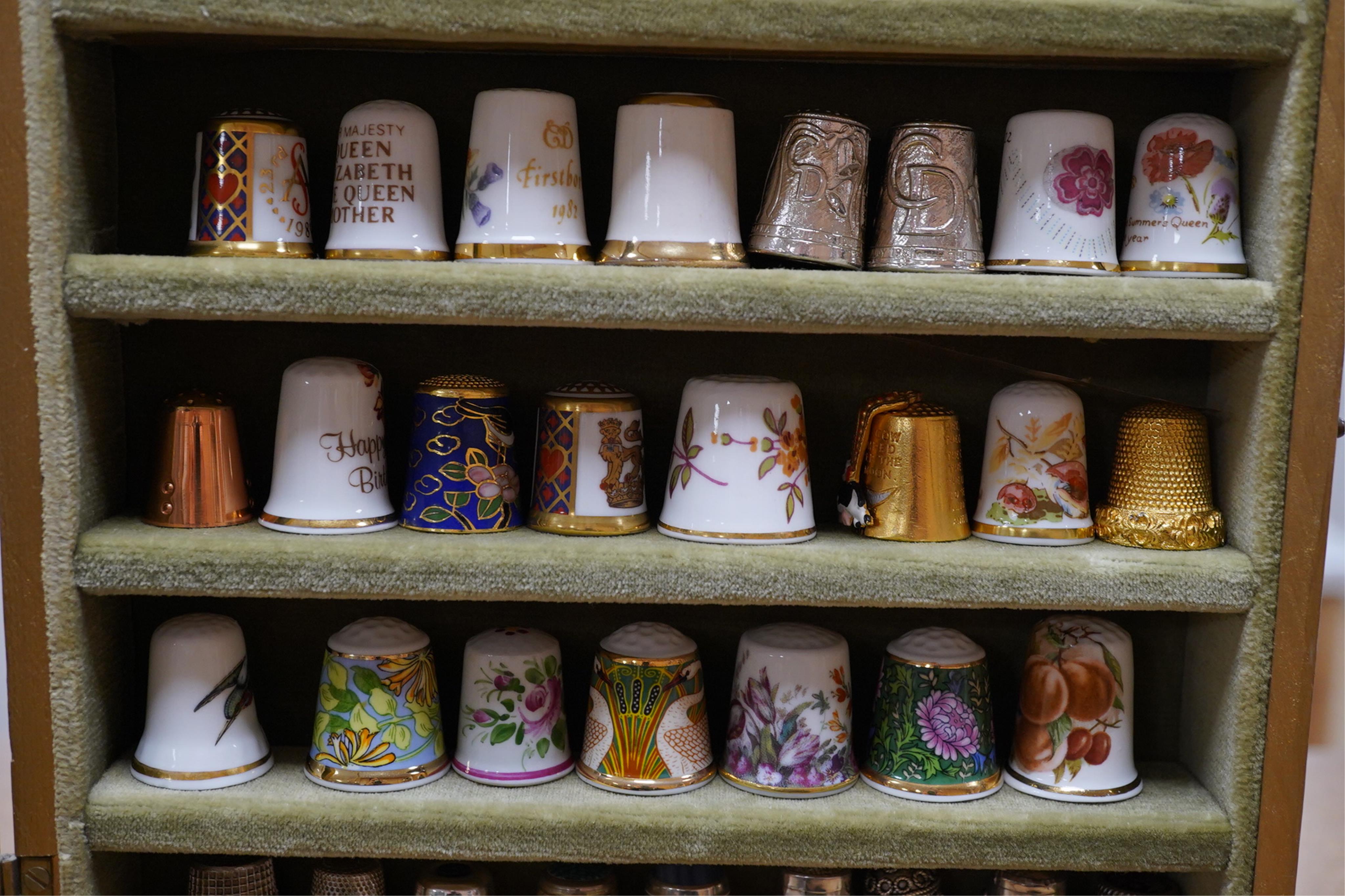 A collection of decorative thimbles, some silver. Condition - good